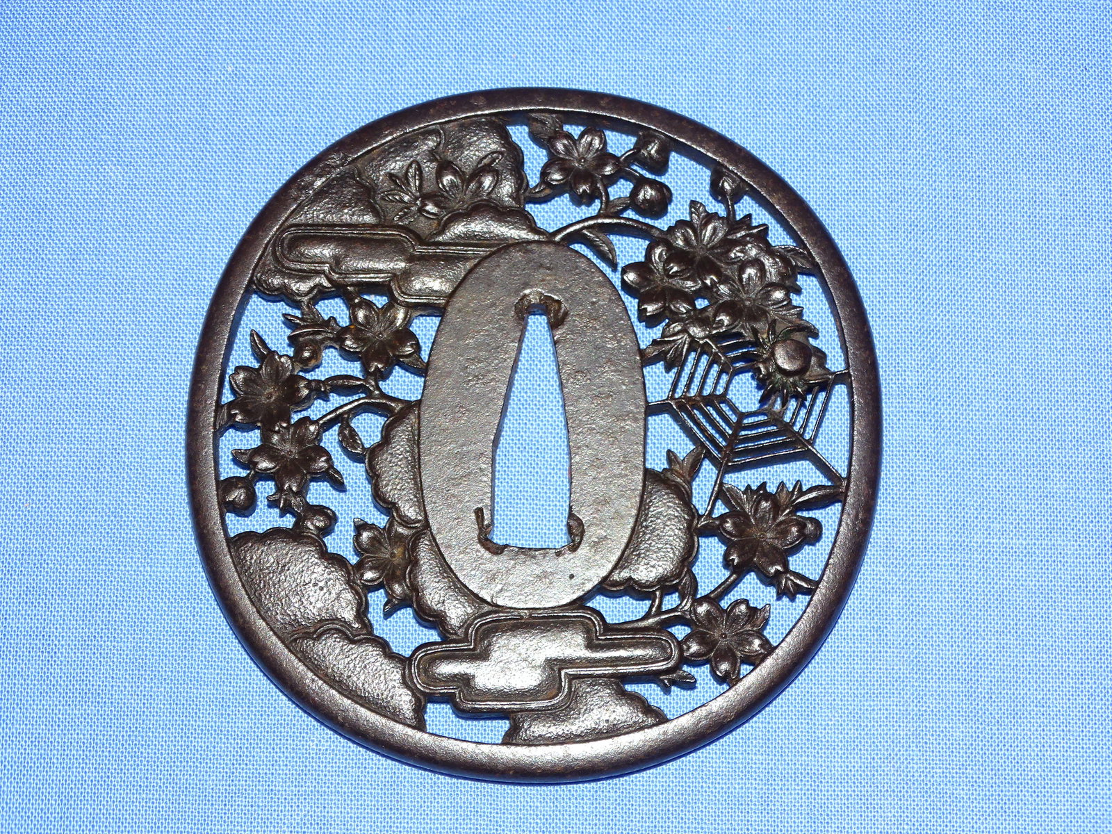 Japanese Samurai Sword Guard TSUBA, Iron w/ Spider in Spiderweb: JAPANESE SAMURAI SWORD TSUBA, PIERCED IRON WITH SCENE OF A SPIDER AND SPIDERWEB.