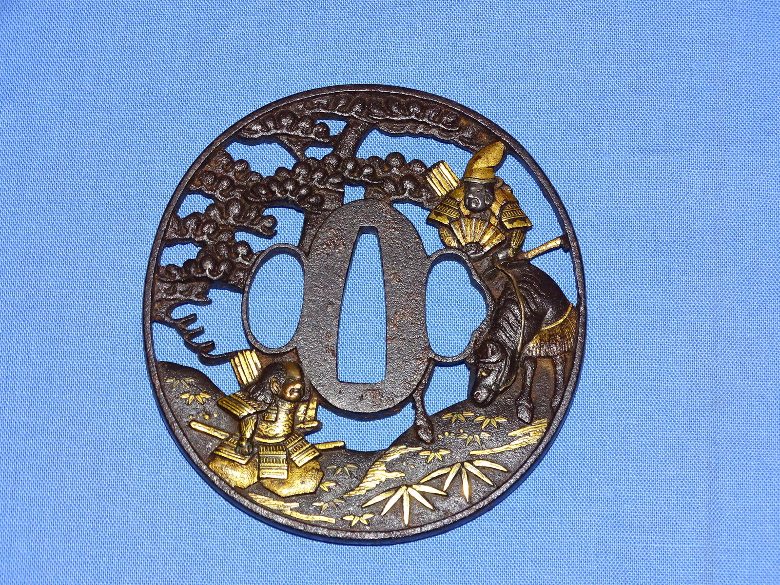 Japanese Samurai Sword Guard TSUBA, Pierced Iron w/ Mixed Metal Warriors: JAPANESE SAMURAI SWORD TSUBA, IRON WITH WARRIORS IN MIXED METALWORK.