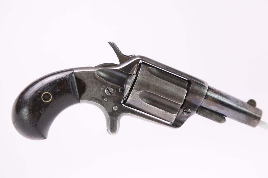 1897 British Proofed Colt New Line 2nd Model Single Action Revolver: 1897 Made British Proofed Colt New Line .38 Centerfire 2nd Model 2 1/4" Single Action Revolver Make: Colt Model: New Line, 2nd Model Serial Number: 9887 Year of Manufacture: 1897 <