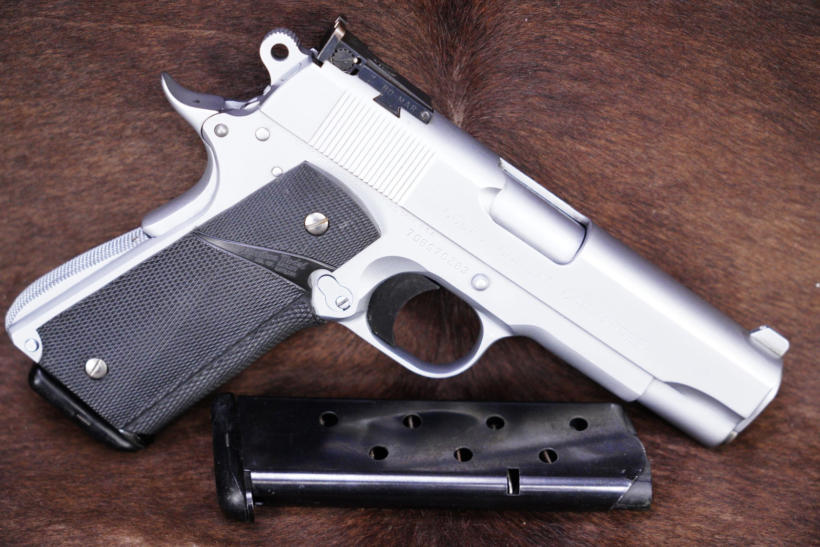 Custom 1970s 1980s Colt Combat Commander .45 ACP Pachmayr-Style 1911 4 1/4" Semi-Auto Pistol 1978: Make: Colt Model: Custom “Combat Commander” Model, Pre-Series '80 Serial Number: 70BS70283 Year of Manufacture: 1978 (https://colt.com/serial-lookup)