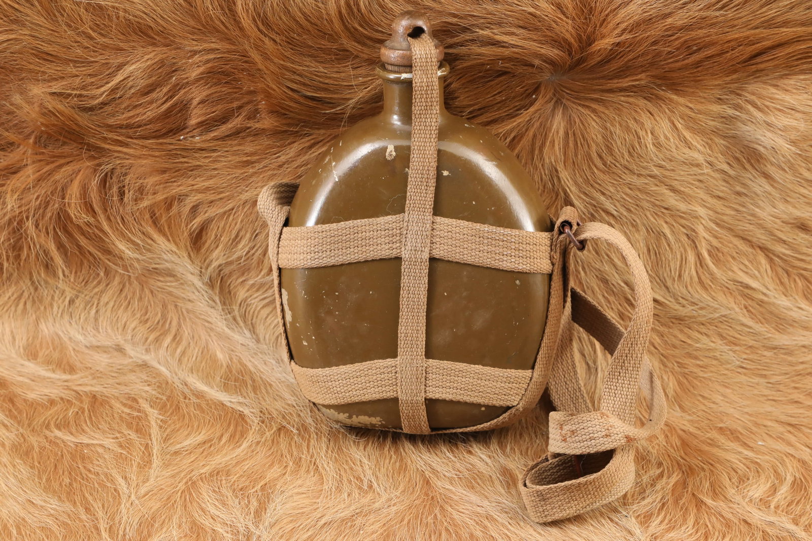 Imperial Japanese Army WW2 Type 94 Brown Painted Aluminum Canteen & Khaki Web Harness: The Japanese soldier of WW2 was a resourceful, resilient fighter, loyal to his Emperor and willing to undergo tremendous hardships. He would, as John Wayne once said, "just as soon die as stick a nick