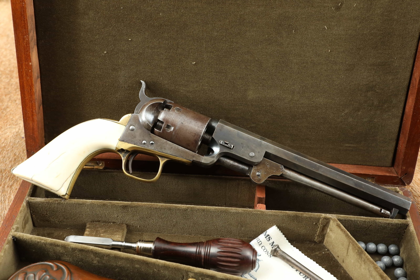 Cased Colt Model 1851 Navy .36 Cal Percussion Cap & Ball Revolver w/ Ivory 1861 Antique: Make: Colt Model: 1851 Navy Serial Number: 102784 Year of Manufacture: 1861 (https://colt.com/serial-lookup) Caliber: .36 Caliber Cap and Ball Action Type: Single Ac