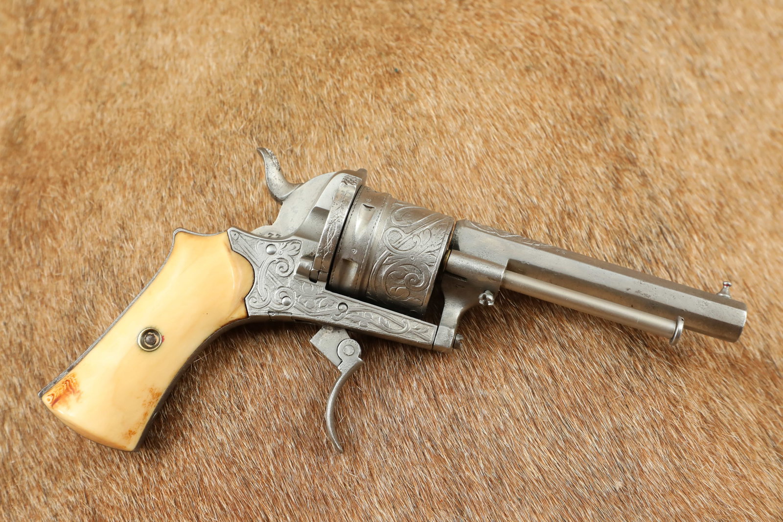 Serial #22 Peterlongo Lefaucheux 3.5” Double Action .30 cal /8mm Centerfire Revolver Antique: Make: Johann Peterlongo Model: Lefaucheux style Revolver Serial#: 22 Year of Manufacture: Circa 1854-1898, Antique Caliber: 8mm / .30 cal. Centerfire Action Type: Single and Double-Action Pinfire Revo