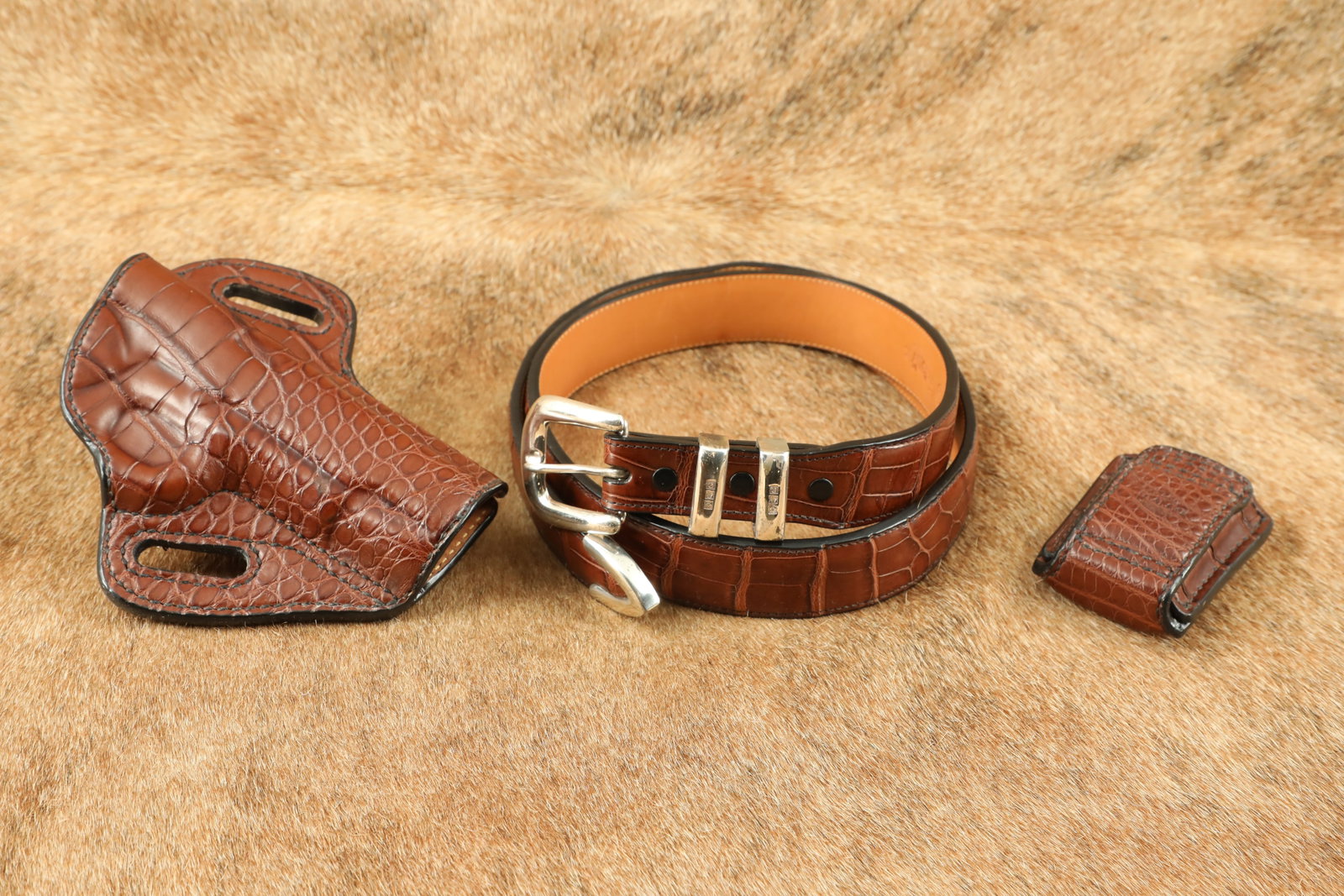 Galco “Exotic” Alligator Leather Colt 3” Officer Pistol Holster, Mag Pouch, Belt: Galco International, formerly known as The Famous Jackass Leather Company, was founded by Richard N. Gallagher in 1969 as a small family business in Chicago, Illinois. In 1980, the name of the company