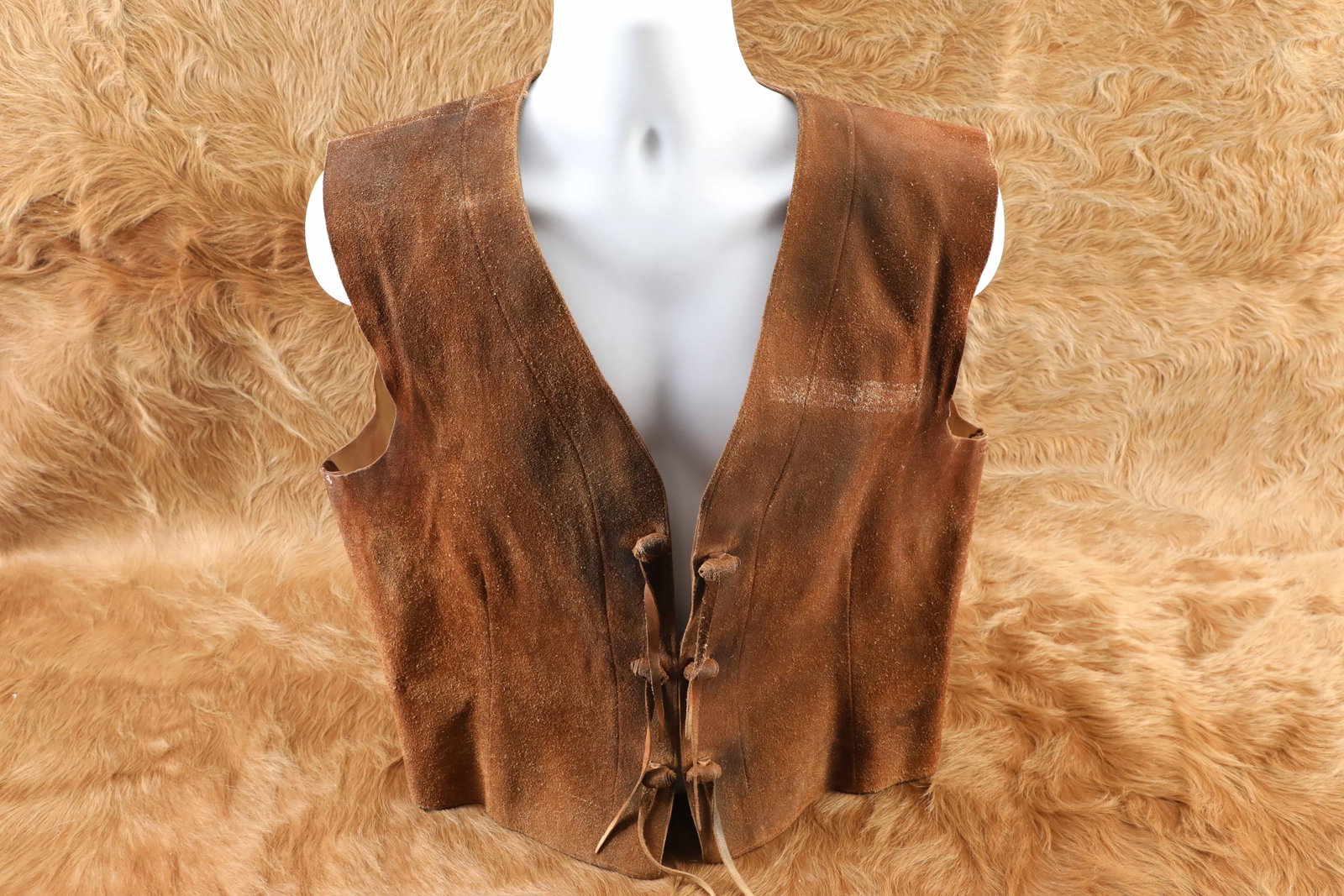 Vintage 1960s Chuck Connors Movie & TV Star Owned Film Prop Buckskin Leather Vest W/ COA: Legend has it that Chuck Connors' brief yet memorable appearance as Burn Sanderson, a Texas rancher with a heart of gold, in the 1957 Disney classic "Old Yeller" led to him earning the starring role i