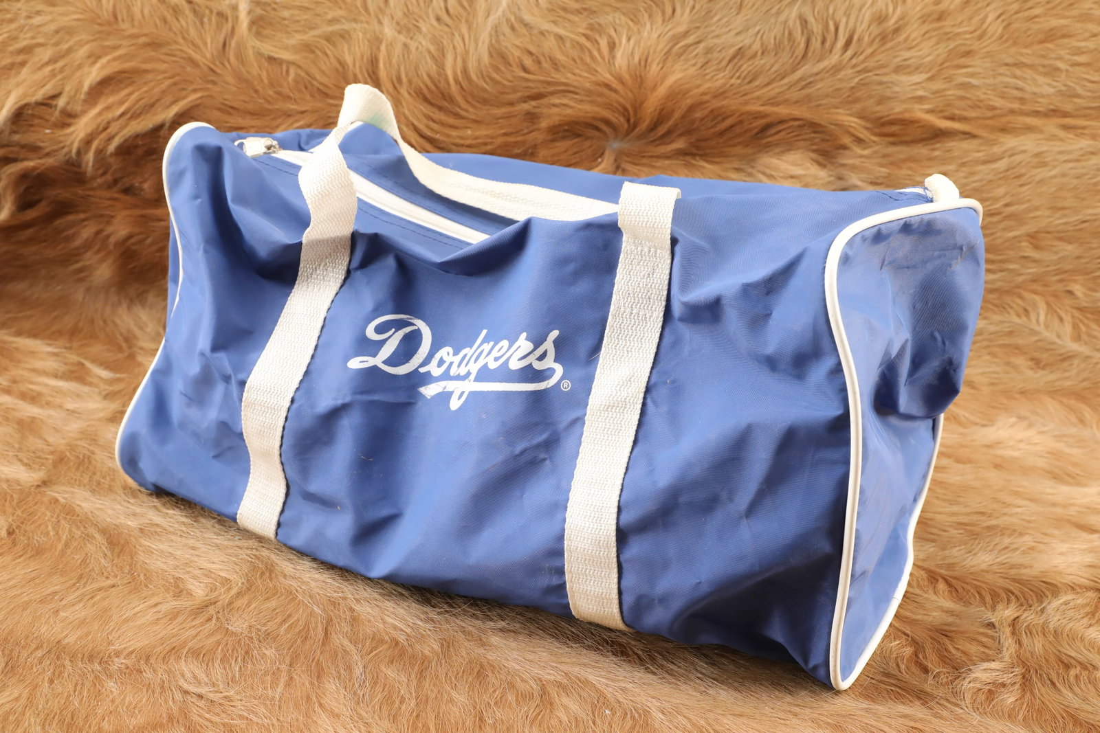 Vintage 1980s Chuck Connors Movie & TV Star Owned Los Angeles Dodgers Gym/Gun Bag With COA: Legend has it that Chuck Connors' brief yet memorable appearance as Burn Sanderson, a Texas rancher with a heart of gold, in the 1957 Disney classic "Old Yeller" led to him earning the starring role i