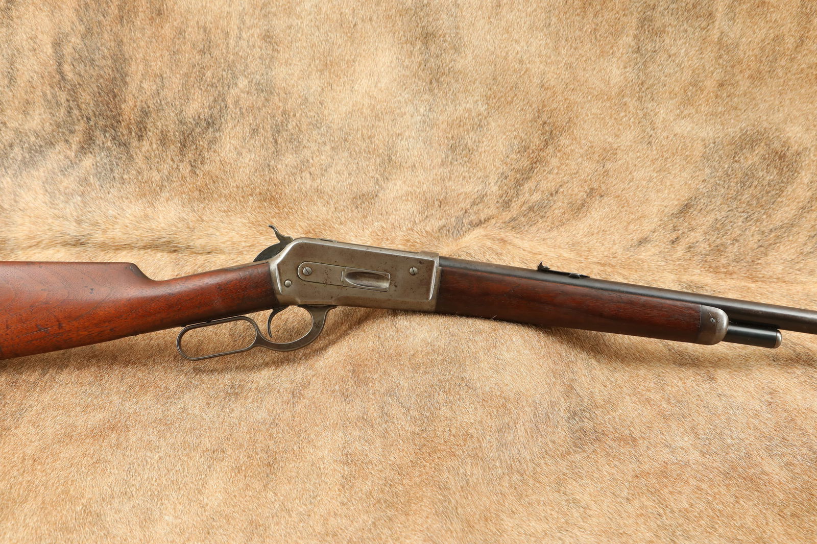 Winchester Model 1886 26" Round Barrel Half-Magazine .50-110 Express Lever Action Rifle, 1911 C&R: Make: Winchester Model: 1886 Serial Number: 150444 Year of Manufacture: Ca. 1911 Caliber: .50-110 Express Action Type: Lever Action Rifle with Tubular Magazine Markings: The left of the barrel is mark