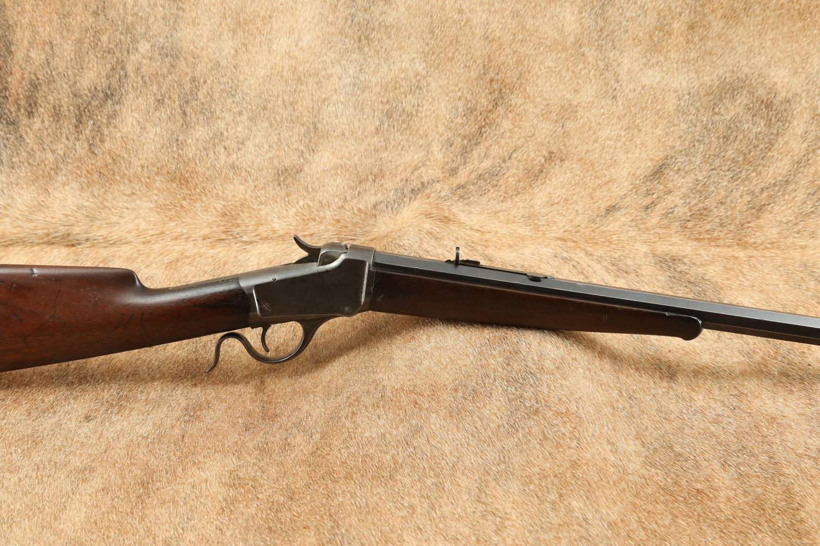 Winchester Model 1885 Low Wall No. 1 24 1/2" .22 Long Single Shot Rifle, Antique 1887: Make: Winchester Model: 1885 Low-Wall Serial Number: 9337 Year of Manufacture: 1887 Caliber: .22 Long Action Type: Lever Actuated Falling Block Single Shot Markings: The top of the barrel is marked ��