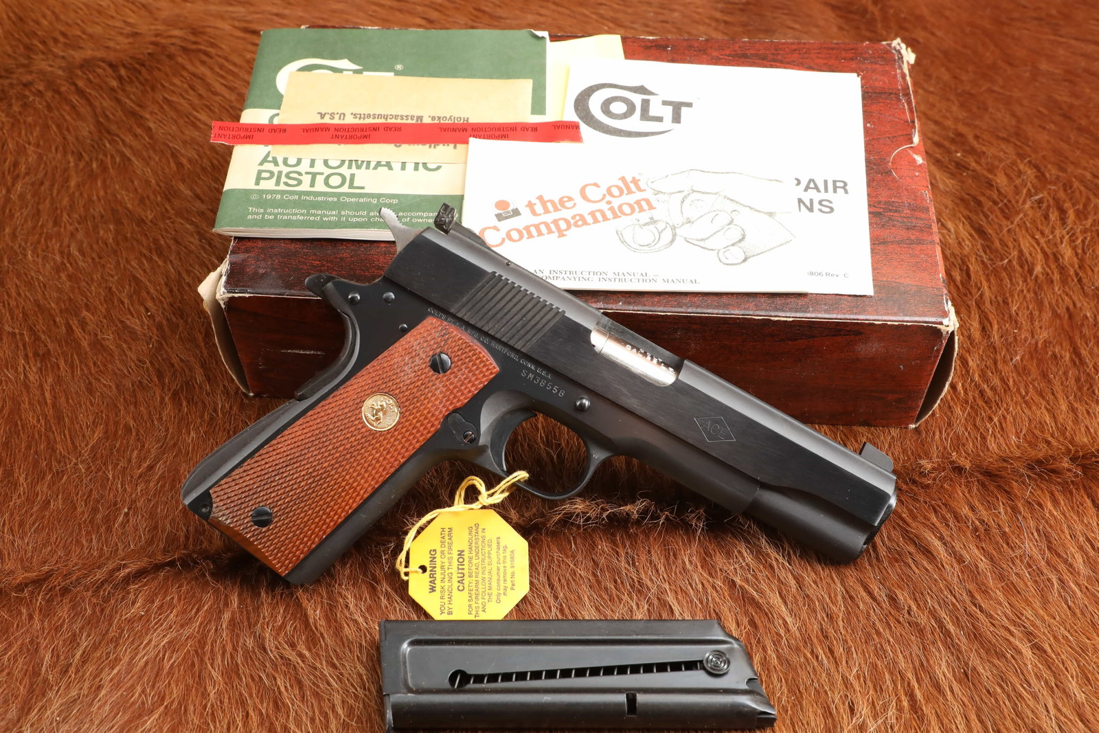 Colt Post-War Service Model ACE .22 LR 4.75” 1911 Semi-Auto Pistol & Box W/ Paperwork 1981: Make: Colt Model: Service Model Ace Serial Number: SM38558 Year of Manufacture: 1981 Caliber: .22 Long Rifle Action Type: Single Action Semi-Automatic with Removable Magazine Barrel Length: 4 3/4&rdqu
