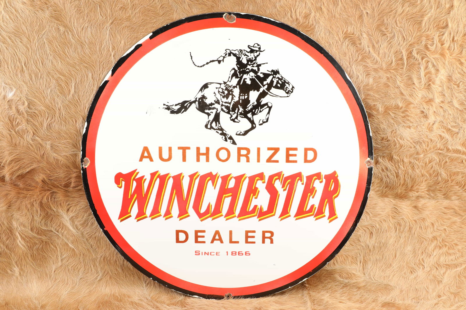 Modern Made 30” Winchester Authorized Dealer “Horse & Rider” Porcelain On Steel: The name Winchester has been synonymous with finely crafted American made firearms since 1866. This Modern Made 30” Winchester Authorized Dealer “Horse & Rider” Porcelain On Steel Advert