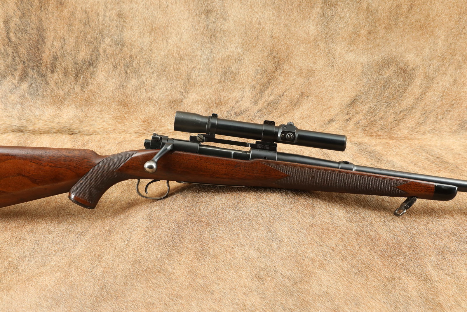 Rare, Late Winchester Model 54 Super Grade .30-06 24” Bolt Action Rifle, Weaver K 2.5 Scope: Make: Winchester Model: 54 Super Grade Serial Number: 49809A Year of Manufacture: 1936 Caliber: .30-06 Springfield (.30 Gov’t ’06) Action Type: Bolt Action Rifle with Internal Box Magazine Marking