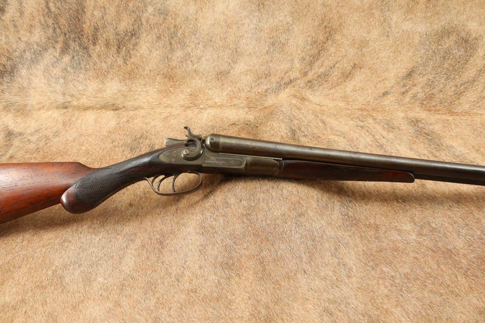 Remington Arms Co. Model 1889 Grade 1 26" MOD/IC 12 GA SXS Shotgun 1902 C&R: Make: Remington Arms Co. Model: 1889, Grade No. 1 Serial#: 226386 Year of Manufacture: 1902 Gauge: 12 Gauge, 2 5/8" Choke: Left: Modified, Right: Improved Cylinder, both Fixed Action Type: Hammere