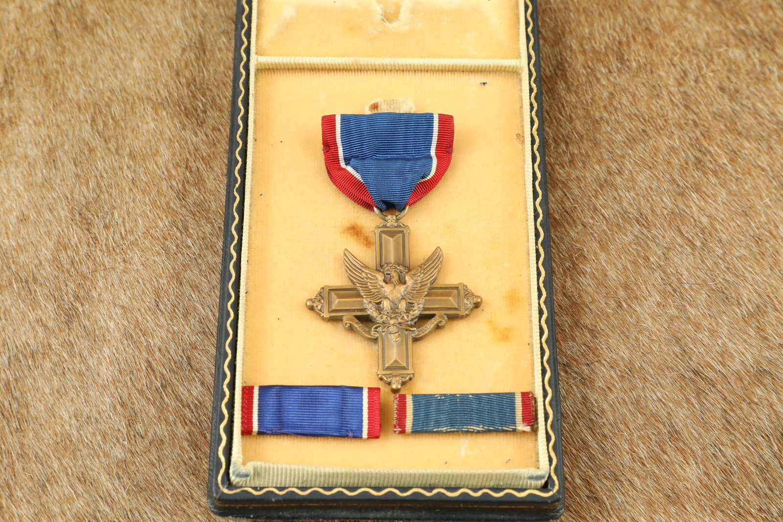 Numbered Distinguished Service Cross Medal with Bar Pin in Case: This listing offers a Vintage Distinguished Service Cross (DSC) Medal, complete with its original bar pin back and housed in a period display case. The Distinguished Service