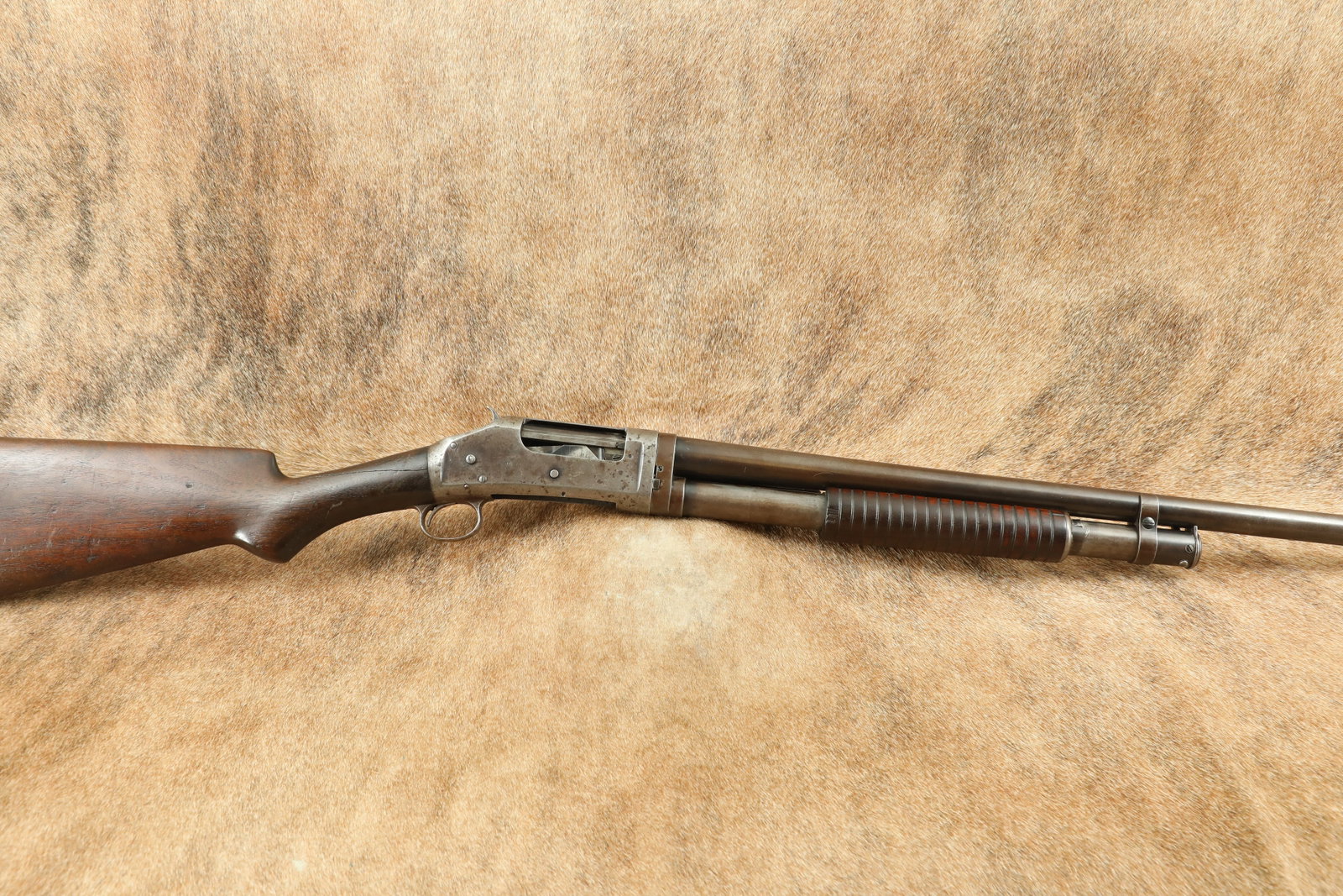 Winchester Takedown Model 97 32” Full 12 Gauge Pump Action Shotgun, MFD 1910 C&R: Make: Winchester Model: 97 Serial Number: 450205 Year of Manufacture: 1910 Caliber: 12 Gauge Action Type: Pump Action, Tubular Magazine Barrel Length: 32” Choke: Full Sights / Optics: The front