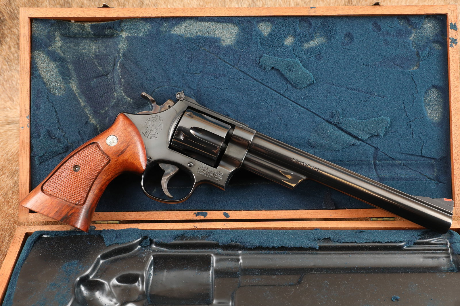 Smith & Wesson S&W Model 25-5 1955 .45 Colt Blue 8 3/8" Revolver & Case, MFD 1979-1980: Make: Smith & Wesson Model: 25-5, 1955 Model .45 Target Heavy Barrel Serial Number: N676873 Year of Manufacture: 1979-1980 Caliber: .45 Colt Action Type: 6-Shot, Double Action / Single Action, Swing-O