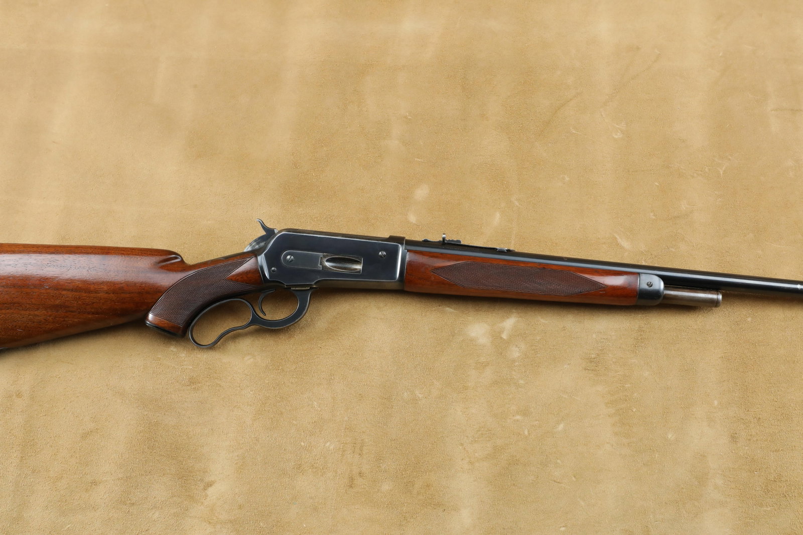 Post-War Short-Tang Winchester Model 71 Deluxe .348 WCF Lever Action Rifle, MFD 1947 C&R: Make: Winchester Repeating Arms Model: 71 Deluxe Serial Number: 24936 Year of Manufacture: 1947 Caliber: .348 Winchester Action Type: This rifle has a lever action with a two thirds length tubular mag