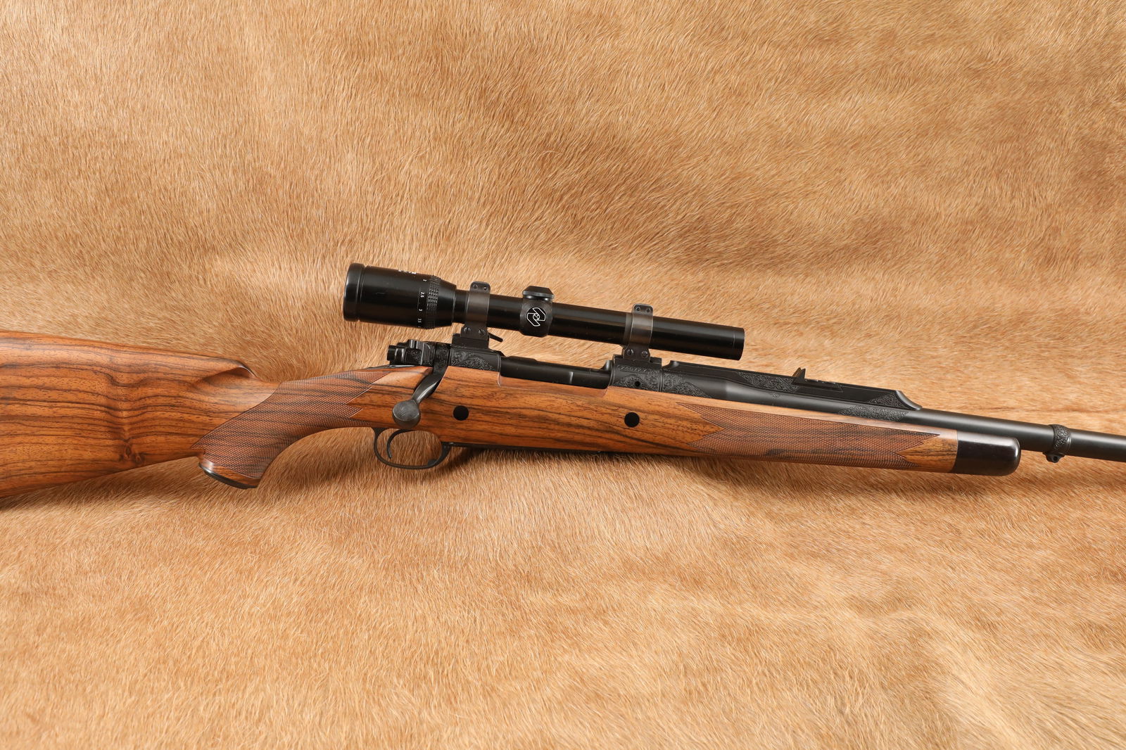 Custom Conco Arms Pre-64 Winchester Model 70 24" .416 Hoffman Bolt Action Safari Rifle, 1953 C&R: Make: Conco Arms, Winchester Model: 70, George Hoffman Tribute Safari Rifle, Engraved by R.W. Warren Serial Number: 246727 Year of Manufacture: 1953 Caliber: .416 Hoffman Action Type: Bolt Action Rifl