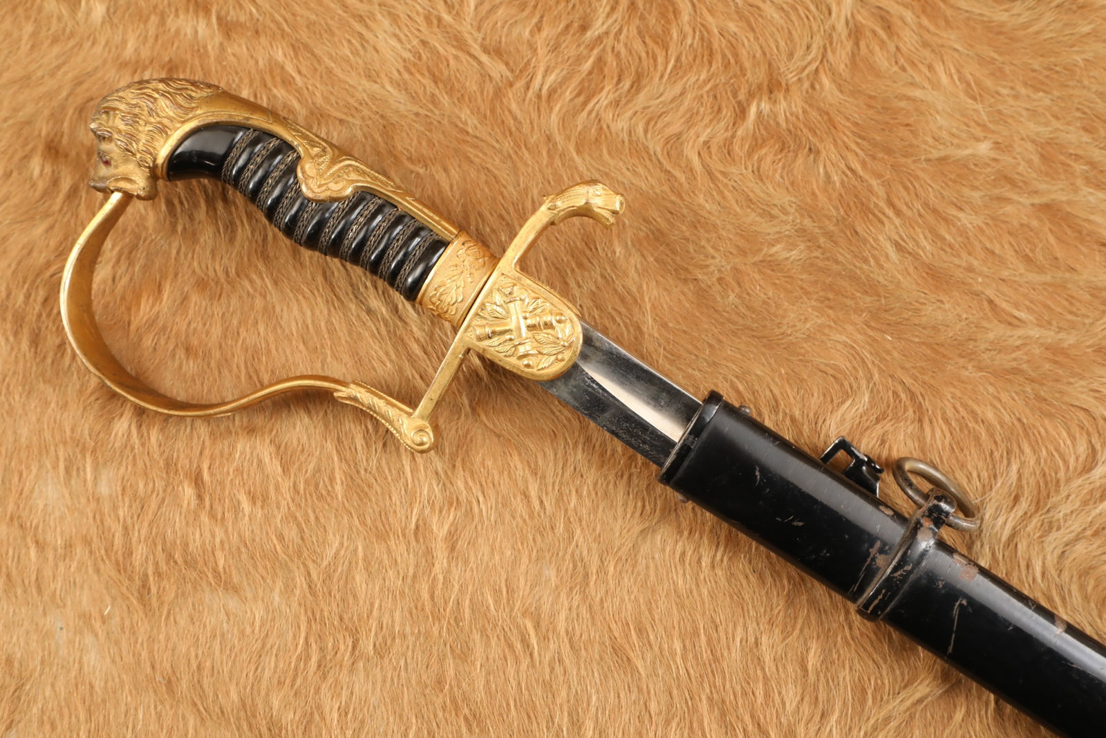 Imperial German Army WWI Artillery Officer's "Lion Head" Pommel Dress Sword & Scabbard: "Artillery lends dignity to what otherwise would be an unsightly brawl." -Frederick the Great of Prussia Imperial German Army Artillery officers of WW1 carried finely made swords as a mark of rank, an