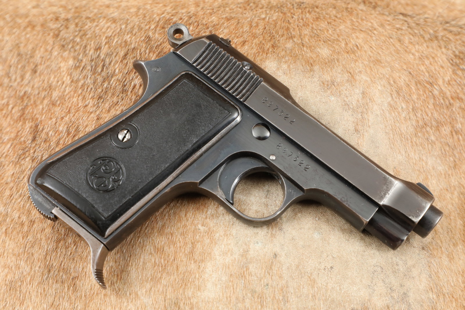 WWII Italian Army Beretta Model 1934 9mm Corto .380 ACP Military Semi-Auto Pistol, 1941 C&R: Make: Beretta Model: 1934 Serial#: 897322 Year of Manufacture: 1941 Caliber: 9mm Corto (.380 ACP) Action Type: Single-Action Semi-Automatic Pistol fed by a Detachable Magazine Barrel Length: 3 3/8" Si