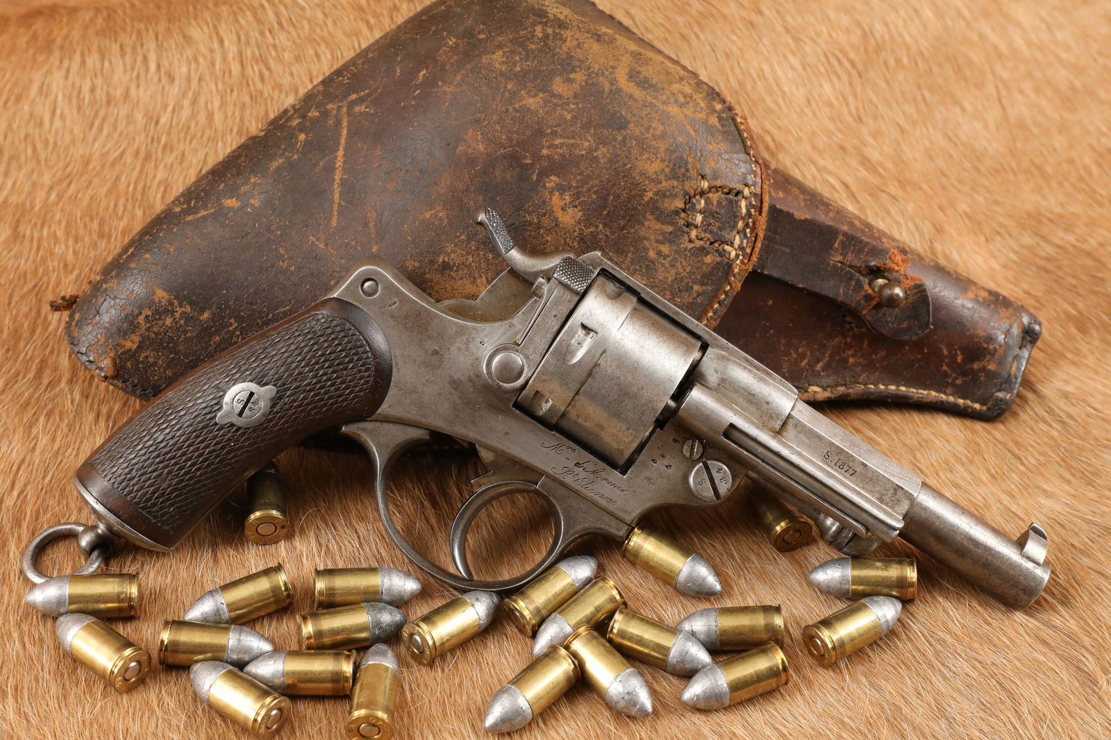 French Model 1873 St. Etienne 4 1/2" SA/DA Revolver, Holster & Ammo, 1877 Antique: Make: Manufacture de Armes de Saint-Etienne Model: Model 1873 Ordnance Revolver Serial Number: G39384 Year of Manufacture: Circa 1877, Antique Caliber: 11mm French Ordnance (11mm Mle 1873) Action Type