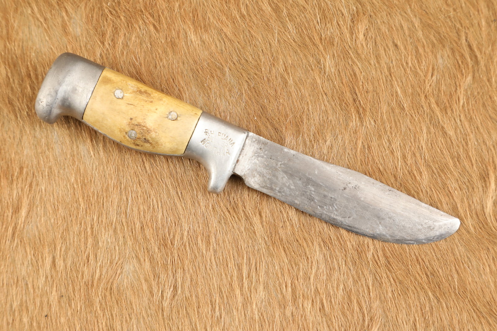 US WW2 Era 1944 R.H. Rudy Ruana Custom Handmade 6'' Small "Square Cut Fighter" Fighting Knife: In the early 1920s, Rudy Ruana served as a blacksmith in the US Armyâ€™s 3rd Field Artillery Regiment, and during that time, he purportedly made his first two knives out of an old Ford leaf sp