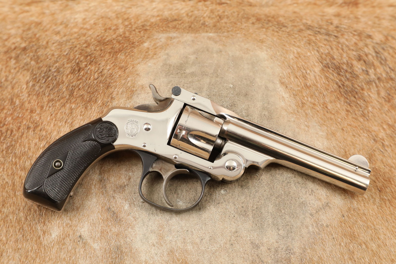 Smith & Wesson 4th Model 3 1/2" Nickel .32 S&W Top-Break Double Action Revolver, 1899-1909 C&R: Make: Smith & Wesson Model: .32 Double Action Fourth Model Serial Number: 232371 Year of Manufacture: 1899-1909 Caliber: .32 S&W Action Type: Top Break, Double Action / Single Action, 5-Shot Revolver