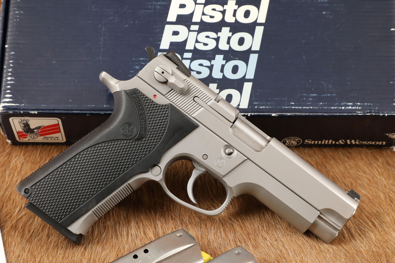 Smith & Wesson Model 4006 104402 .40 S&W 4" DA/SA Semi-Auto Pistol, Box, 4x Mags, 1990-1992: Make: Smith & Wesson Model: 4006, SKU 104402 Serial Number: TFD5932 Year of Manufacture: 1990-1992 Caliber: .40 S&W Action Type: Single/Double Action, Semi-Auto Pistol With Decocker-Safety & Magazine