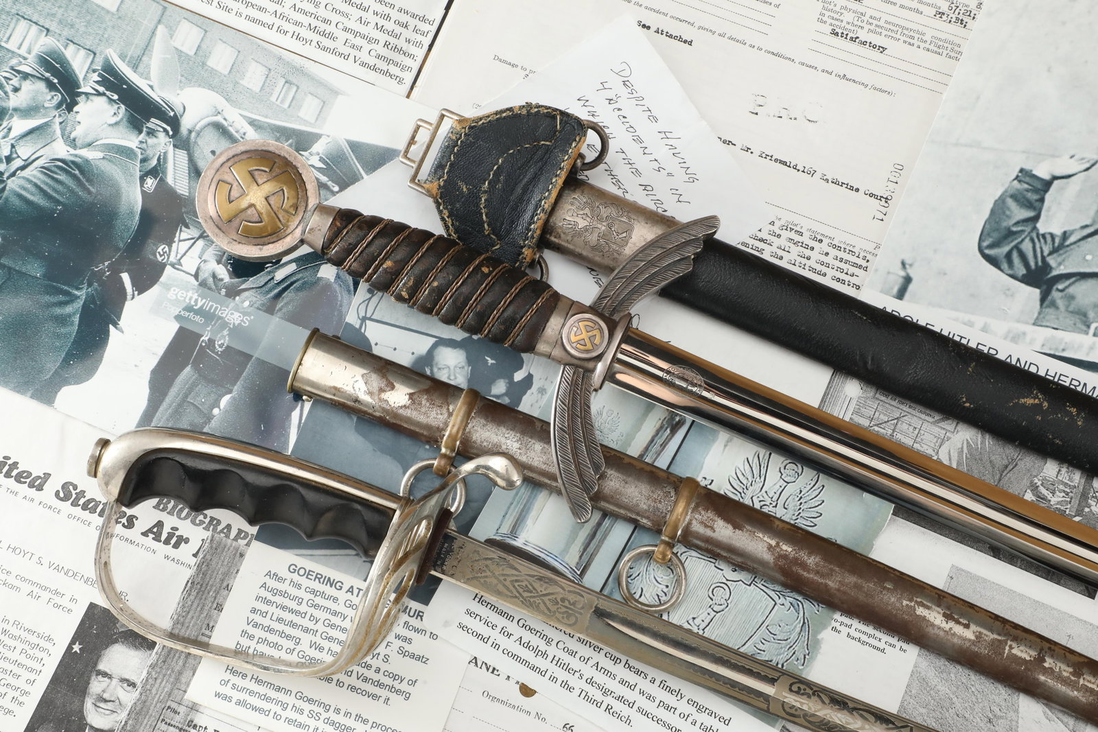 Hermann Goering's Engraved Luftwaffe Officer Captured Sword, General Vandenburg's M-1902 Sword Set: Very Good Condition. In regards to Reichsmarschall Goering's Luftwaffe sword: Some chipping to the left side of the blade tip. Some light scratching to the g