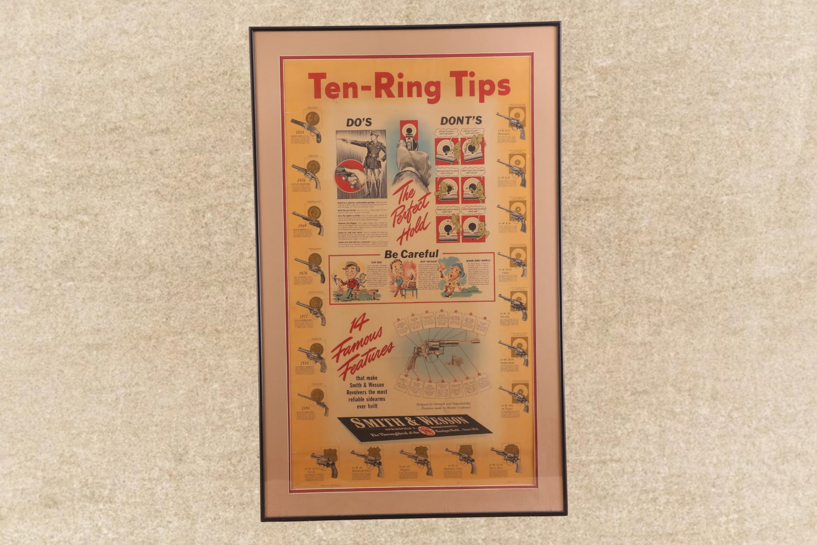 1944 Vintage Framed Smith & Wesson "Ten-Ring Tips" Advertising Poster, 25x40": In-House Shipping: $50.00 + 1.5% Shipping Insurance Vintage Circa 1944 Smith & Wesson color advertising poster entitled “Ten-Ring Tips”, approx. 38” x 23” in overall