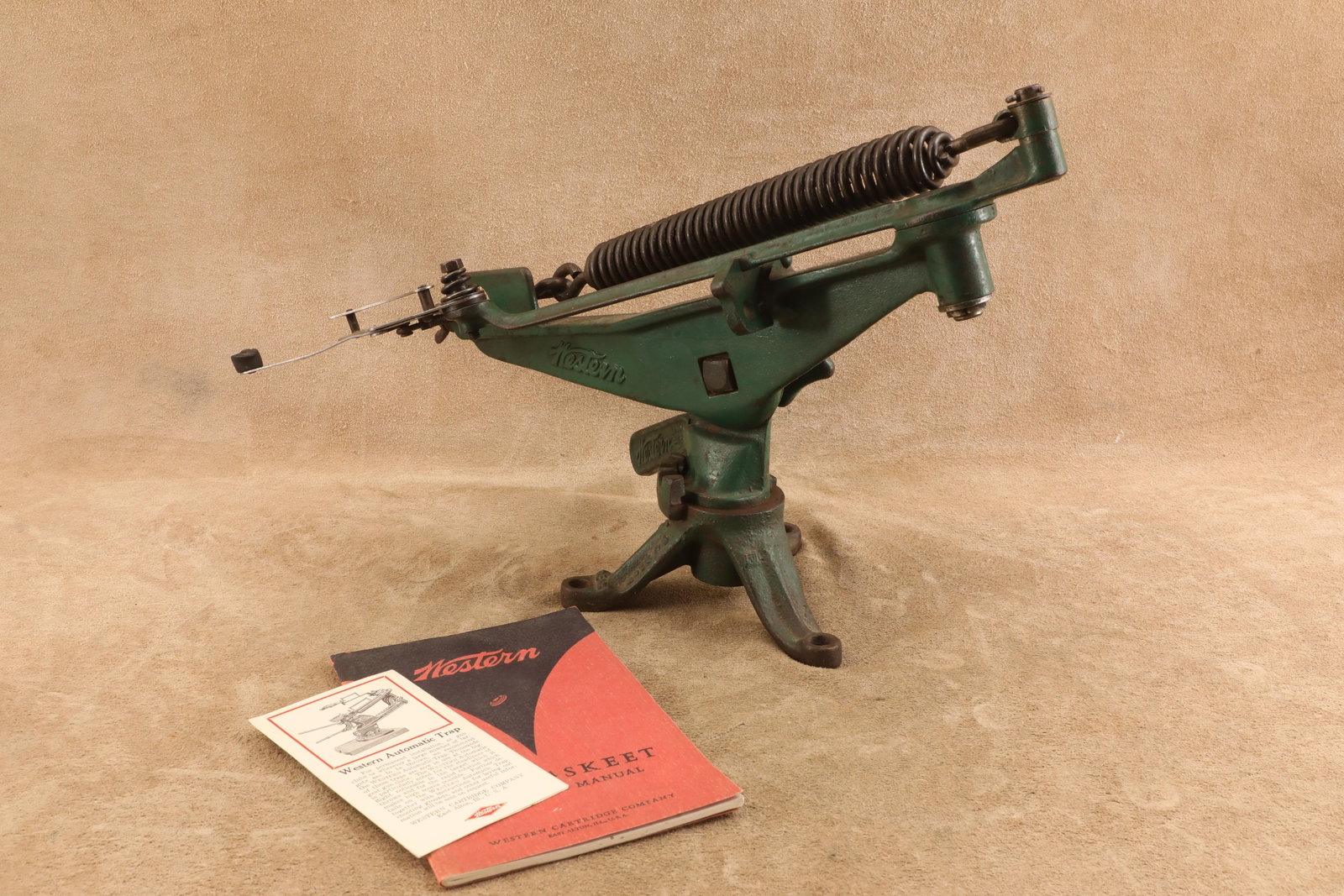 Vintage 1950s Western Model 4072 C1 18" Cast Iron Clay Pigeon Target Thrower Trap Machine with: The item is in very good vintage condition with intact original green paint and normal signs of light shelf wear. There is minor surface oxidation on the unpainted steel tension spring, but the cast i