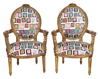 Hunt Slonem Louis XIV Bunny Chairs: A pair of 19th Century giltwood Louis XVI style armchairs by Hunt Slonem, upholstered in the signature bunny fabric. Part of Slonem's "Hop Up Shop" series which is featured currently in the Bergdorf