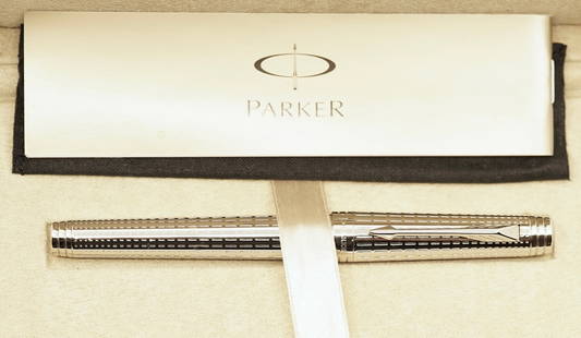 Parker Premier Deluxe Silver ST Rollerball Pen, Boxed: Parker Premier Deluxe rollerball silver pen in Graduated Chiselling finish. Includes box, outer box and slip case. Overall near mint condition.