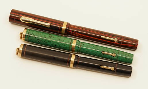 Conklin Endura Fountain Pen Lot (3): Conklin Endura fountain pens (3), in black hard rubber, Verd Green, and Mahogany. The lot consists of a model 37P Black hard rubber Endura ring top pen, 37SG Verd Green ring top pen and 47SMC Mahogany