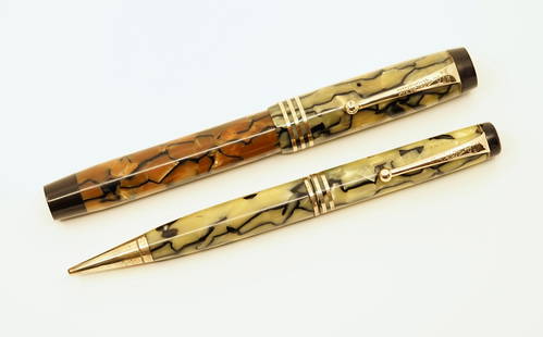 Parker Duofold Sr Black & Pearl Fountain Pen Set: Parker Duofold Deluxe Streamlined Senior set in Pearl with Black veins. This Deluxe Senior set has triple cap bands and a Parker Duofold Deluxe extra fine nib with Christmas Tree feed. Overall mixed c