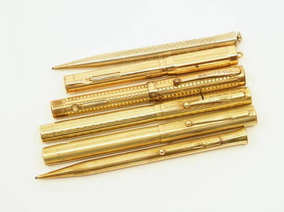 Sheaffer Gold Filled Flattop Fountain Pen Lot (6): Sheaffer early metal flattop lot (6). The lot consists of four fountain pens, all gold filled and two pencils (one gold filled and one silver). The pens all have Sheaffer 14k nibs (one slightly later)