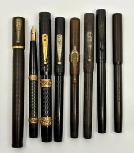 Waterman Ideal Eyedropper Fill Fountain Pen Lot (8): Waterman Ideal smooth and chased black hard rubber eyedropper fill fountain pen lot (8). The lot consists of five #12 pens, a Waterman made Remex pen, a 45 safety and a 16. Overall mixed condition, so