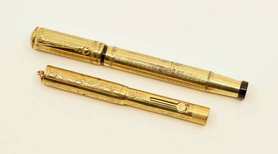 Waterman Gold Filled & Ideal Safety Fountain Pens: Waterman and Ideal gold filled fountain pens (2). The lot consists of a Waterman 0552 1/2 V in vine pattern with a replacement Mabie Todd 14k extra fine flex nib, together with a gold filled Ideal Eur