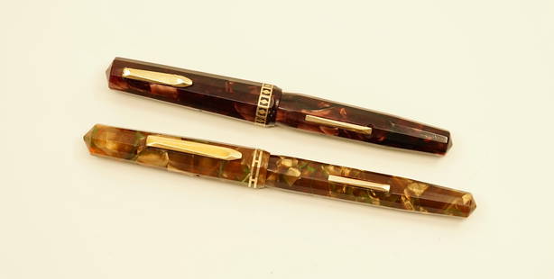 Wahl Eversharp Doric Fountain Pens Special Nibs (2): Wahl Eversharp Doric (2), gold with green veins and Morocco marble. Both pens have cracks, the Morocco marble pen has an adjustable #5 14k nib (small crack at the base of the adjuster, does not effect