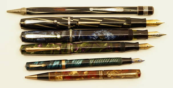 Eversharp & Wahl Oxford Fountain Pen & Pencil Lot (6): Eversharp (3) and Wahl Oxford (3) fountain pens and mechanical pencils. The lot consists of a Bantam in blue marbled, a Junior in green marble with purple, Art Deco style pencil in black with white, a