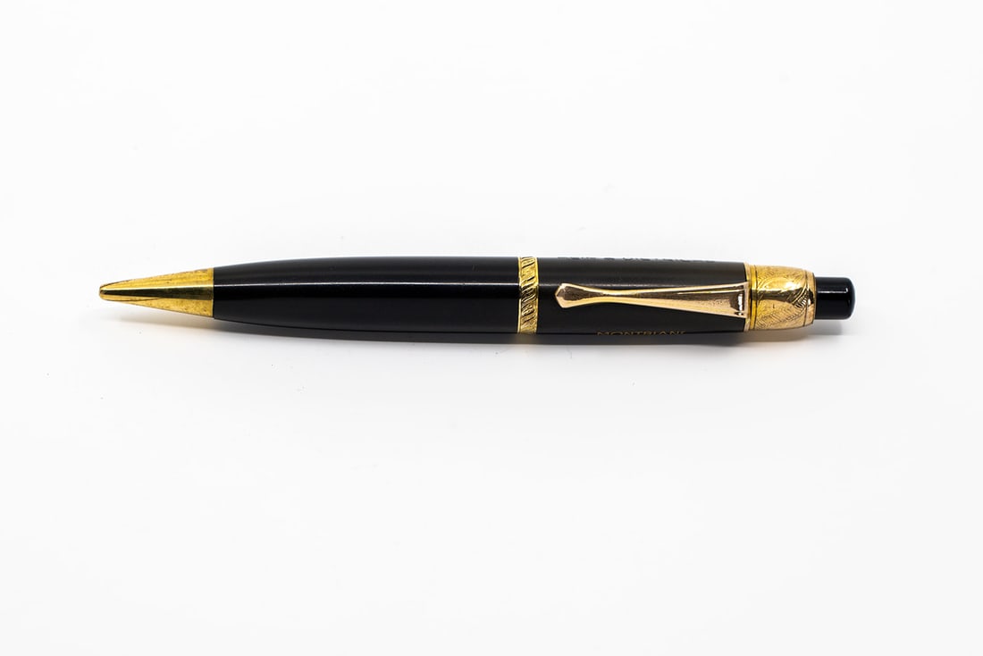 Montblanc L72 Pix Mechanical Pencil: Montblanc L72 Pix black hard rubber with decorative gold design mechanical pencil. Decorative version of the standard Montblanc push button pencil in black hard rubber with gold filled design on the t