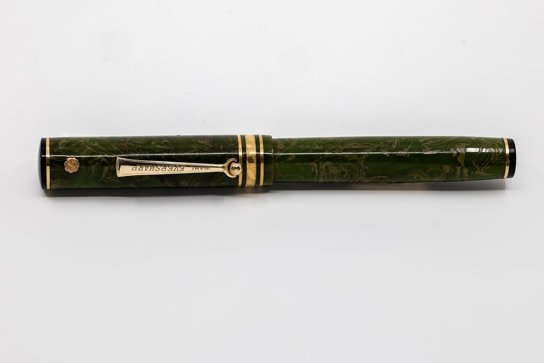 Wahl Eversharp Brazilian Green Oversized Fountain Pen: Wahl Eversharp Gold Seal Brazilian Green oversized flattop fountain pen. Clean example with rhomboid band and roller clip, Wahl Eversharp 14K Gold Seal Signature medium nib with flex, bright imprints.