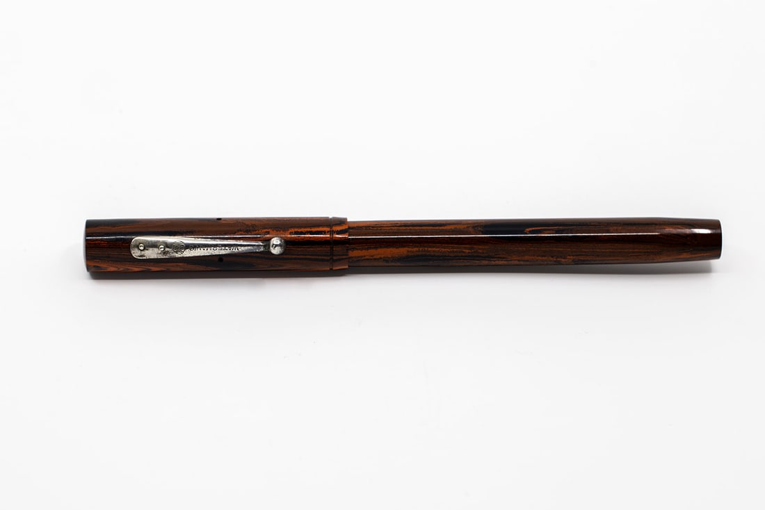 Waterman 72 1/2 Eyedropper Woodgrain Fountain Pen: Waterman 72 1/2 eyedropper fill woodgrain hard rubber fountain pen. The 7X series of Waterman pens were made when their 5X lever fill pens were by far their most popular. Some purchasers wanted an eye