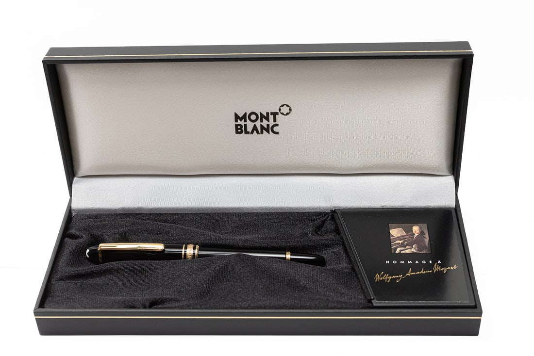 Montblanc Homage WA Mozart 114 Fountain Pen, Boxed: Montblanc Homage A Wolfgang Amadeus Mozart 114 fountain pen with box, outer box and papers. Outer box correct marked WAM, fountain pen with medium 14 K nib, pen with metal ferrule near end for cap to 