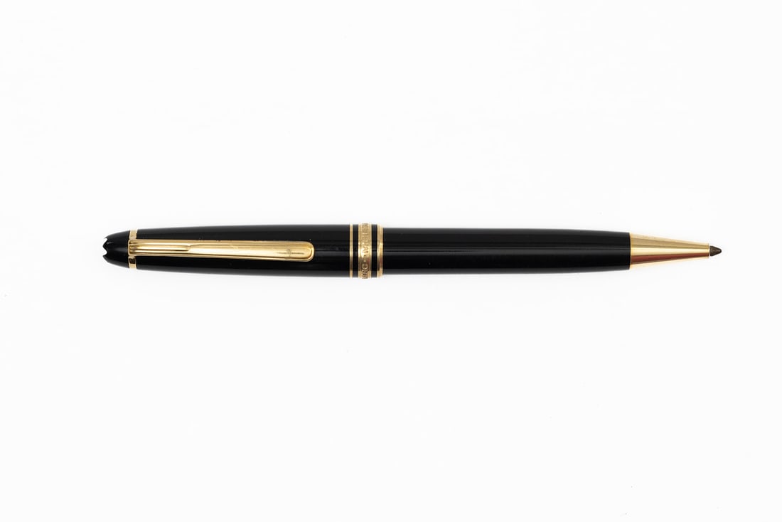 Montblanc 164 Ballpoint Gold Trim Pen, Boxed: Montblanc 164 ballpoint pen, black with gold trim with box and outer box. Classic Montblanc ballpoint with twist action, clip marked Germany. Length 5 3/8”. Overall good condition with light scr
