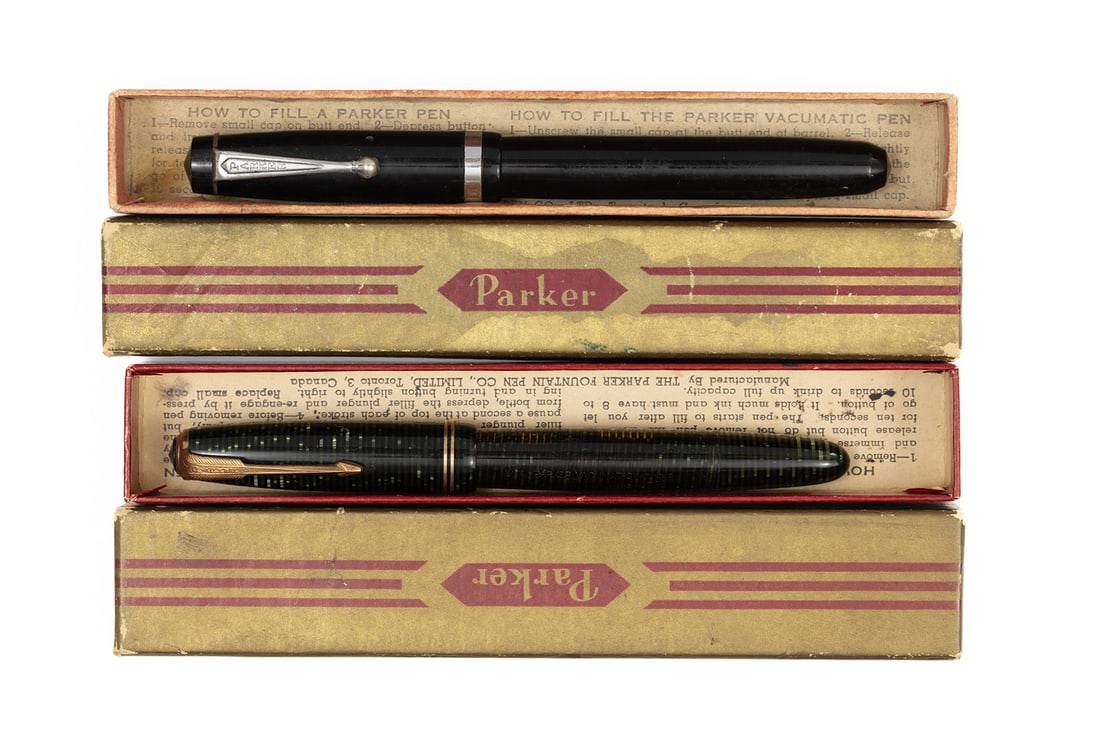 Parker Challenger & Vacumatic Flexible Nib Fountain Pens (2): Parker Challenger and Vacumatic fountain pens, boxed. This lot consists of Parker Challenger in black with nickel trim with Parker Fountain Pen Canada 14K fine flexible nib and Parker Vacumatic Junior