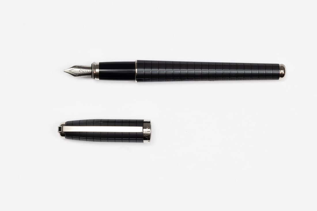 S.T. Dupont Fidelio Anthracite Guilloche Fountain Pen: S.T. Dupont Fidelio Anthracite Guilloche fountain pen with box, outer box and papers. Fidelio model in Anthracite Guilloche, serial number stamped on clip, medium 14K nib. Length 5 1/4” and 5 3/