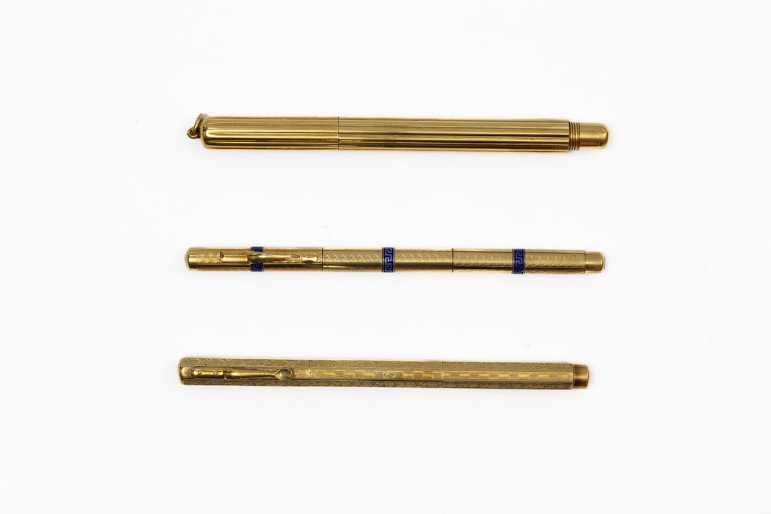 Gold Filled European Fountain Pen/Pencil Combinations (3): Gold filled European fountain pen combos (3). Two slender 18K rolled gold pens, one multisided with floral pattern, other with blue enamel bands, both with flexible 14K nibs, along with heavy unmarked