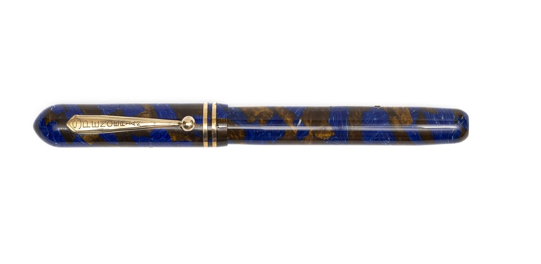 Conklin Blue & Bronze Marble Spencerian Fountain Pen: Conklin made Spencerian blue/bronze marble fountain pen. Spencerian was a Conklin sub-brand, the shape is similar to that of the Symetric with pinned lever. Clip marked Spencerian with lever marked S,