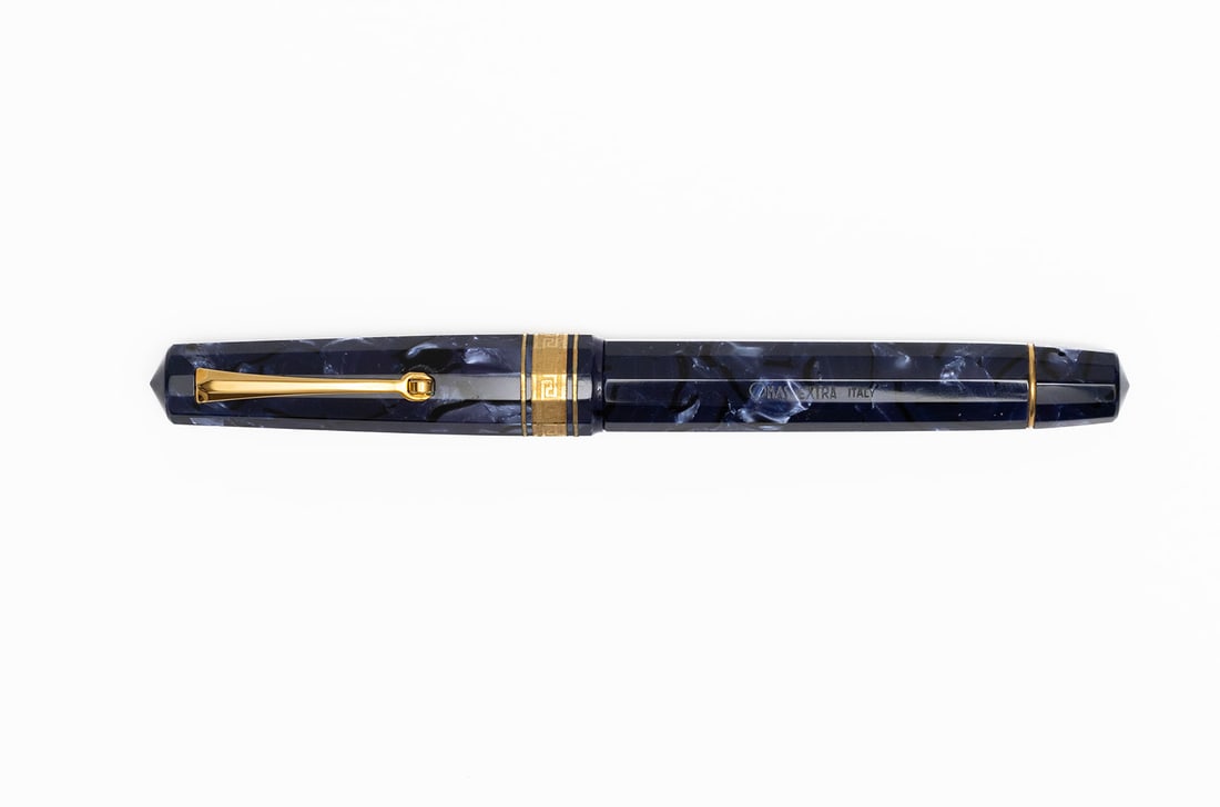 Omas Paragon 1997 Blue Royale Celluloid Fountain Pen: Omas Paragon 1997 Blue Royale Celluloid fountain pen, with box, outer box and papers. The Omas Paragon is probably their best known pen and shares the styling of their pens from the 1930’s and 40’