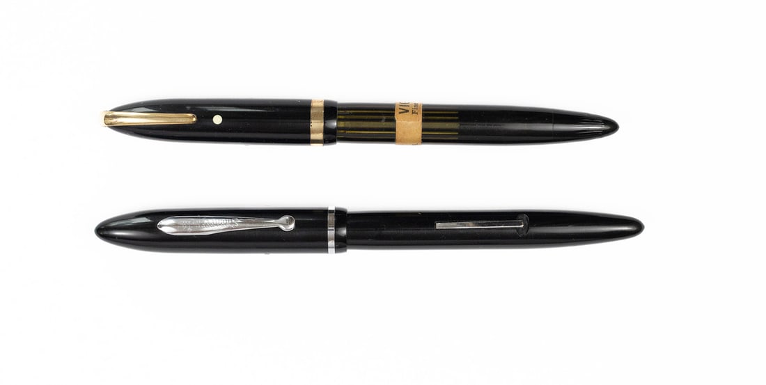 Sheaffer Balance Junior & Valiant Fountain Pens, Original Stickers: Sheaffer Balance Junior and Valiant fountain pens with original stickers. Sheaffer Junior 275 model with original circular sticker on barrel, Valiant military clip with barrel cigar band sticker, both
